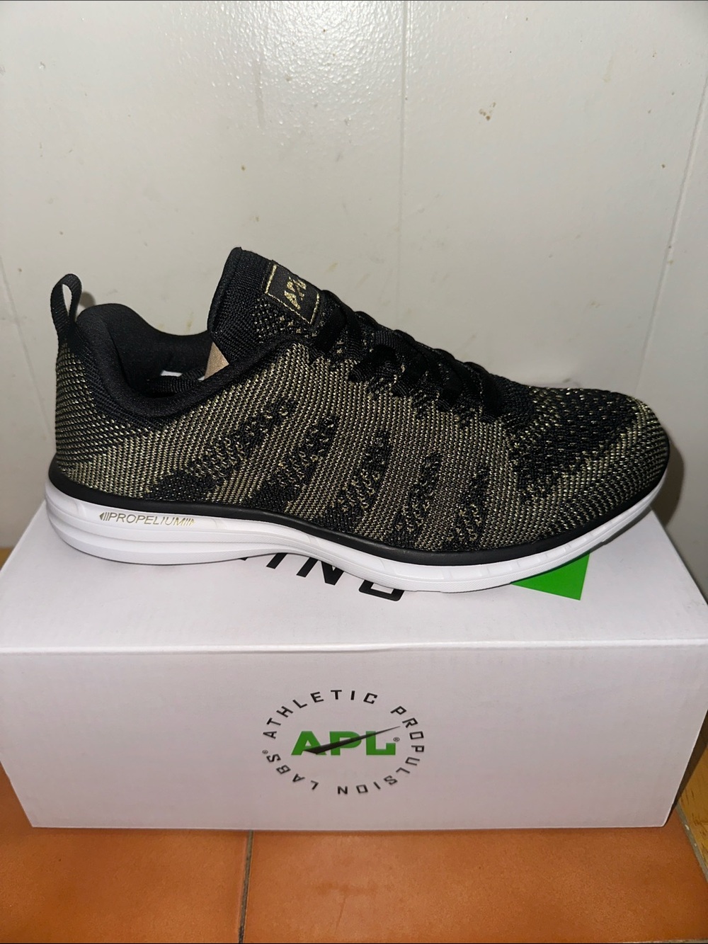 APL Men’s TechLoom Running Shoe in Black and Olive Green